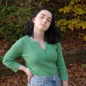 Green ribbed Henley sweater